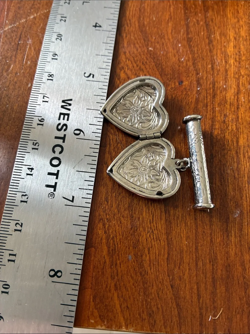 Vintage silver tone locket brooch